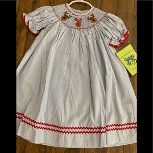 Smocked bishop dress.